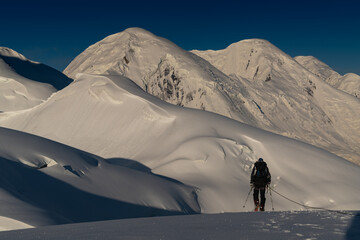 High Altitude Mountaineering in Central Tien Shan Mountains with Climber on Snowy Ridge © Photonatures
