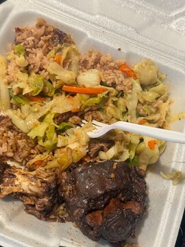 Jamaican Stewed Oxtail with Rice and Peas and Steamed Cabbage