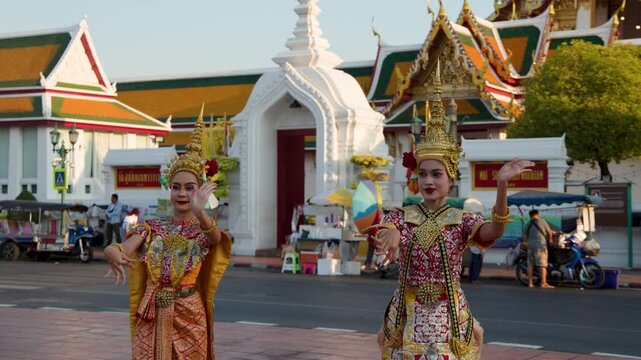 Thai Traditional Dancers Performing in Front of Wat Suthat Bangkok