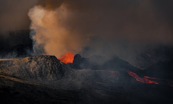 Erupting volcano with lava fountains and lava field, crater with erupting lava and lava flow, Fagradalsfjall, Kr&yacute;suv&iacute;k volcano system, Reykjanes Peninsula, Iceland