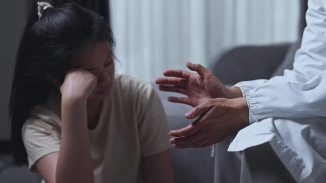 Mental health professional listening and offering hope to a teenager with anxiety and depression.