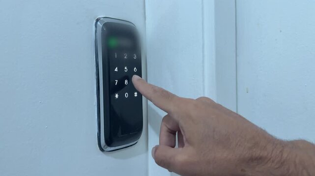 Security code entries on a smart digital door keypad, illustrating keyless apartment access, modern home security, electronic entry and connected living technology