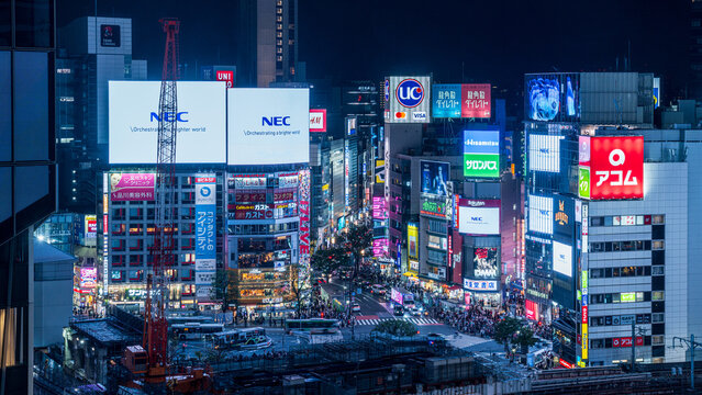 Shibuya, Tokyo, Japan - September 27 2025: Shibuya Scramble Crossing with many video and static advertising signs