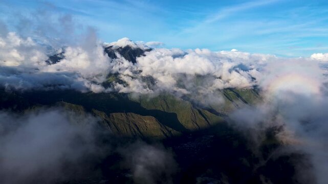 Aerial View of Clouds Drifting Over Green Andean Mountain Ridge in Ecuador, High Altitude Volcano Landscape and Scenic Nature Travel Background