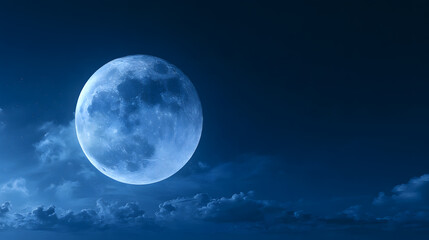 Fototapeta premium Full moon shining brightly in a clear night sky with clouds