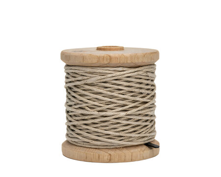 Wooden spool of natural jute twine with wrapped fiber cord isolated on transparent background