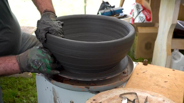 Potter working on a pottery wheel