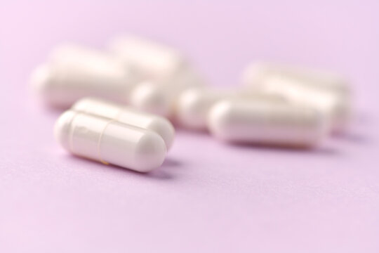 Citicoline capsules. Citicoline is a supplement that boost brain performance and improve memory. Bright background. Soft focus. Close up. Copy space