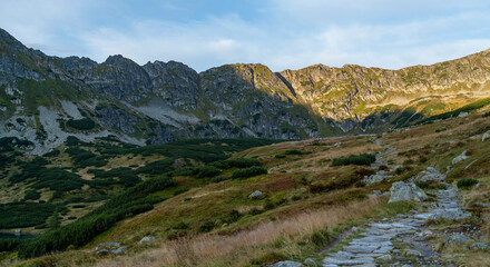 A trail leading through the valley, with a view of the ridge in the morning. © gubernat