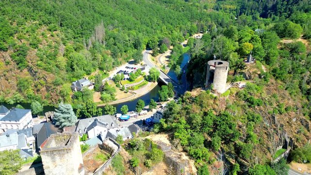 September 10, 2026 - Aerial drone view of the medieval Esch-sur-S&ucirc;re castle ruins and village in the scenic river valley of Luxembourg.