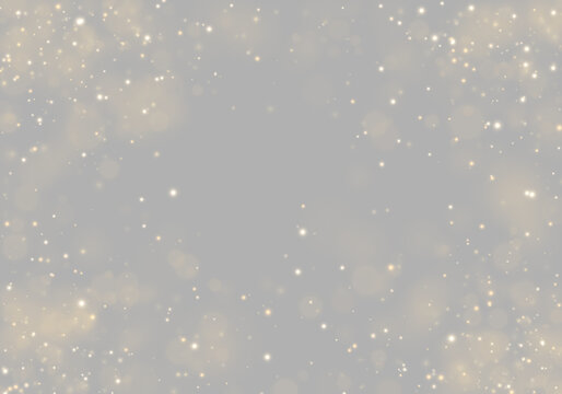 Golden sparkling particles scattered across a dark background create a dynamic bokeh effect. The lights vary in size and intensity, producing a soft glowing ambiance.