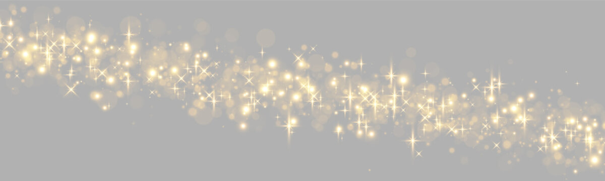 A dense trail of shimmering golden sparkles flows diagonally across a black background. The image features soft glowing orbs interspersed with sharp star-shaped light flares.