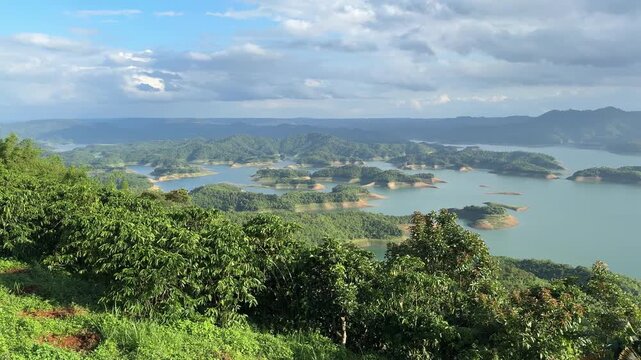 Aerial view of Ta Dung Lake and green hills in Dak Nong, central Vietnam.