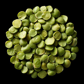 Green split peas in macro isolated on black background with clipping path, conveying nutrition and natural food concept value