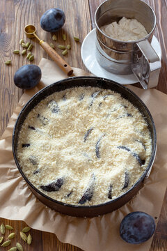 Making homemade plum pie.