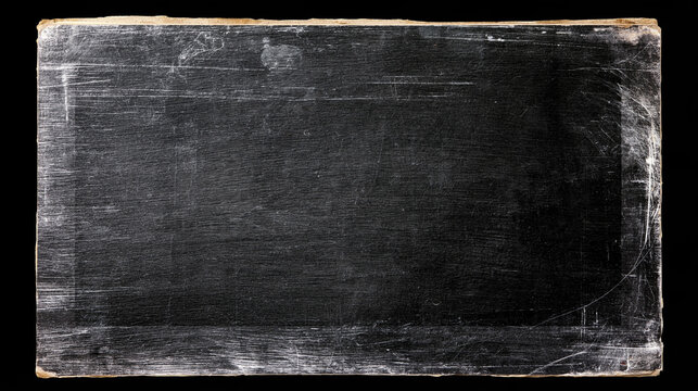 Vintage black chalkboard with visible scratches and wear, suitable for educational or decorative purposes, isolated on a black background for clear visibility