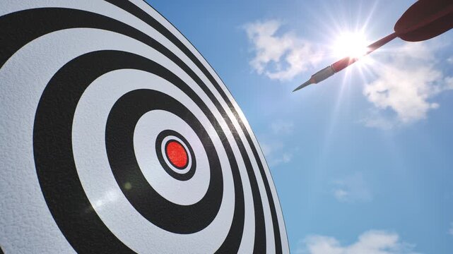 Slow motion Red dart arrow hitting  on bullseye target against blue sky. 3d animation. success strategy and precision concept, 