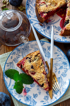 Piece of traditional German plum pie (Pflaumenkuchen).