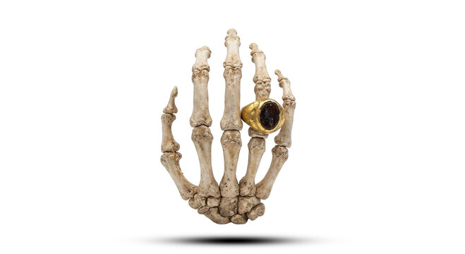 Ancient Skeleton Hand Wearing Gold Ring