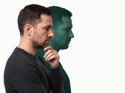 Double exposure conceptual portrait of man experiencing schizophrenia and split personality disorder isolated on white background

