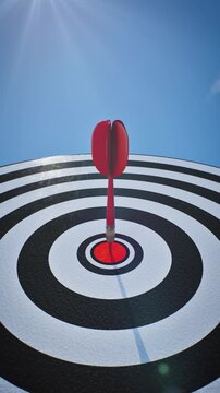 Business target and mission success, Zoom Out low angle shot of red dart hitting bullseye target concept. 3d animation.