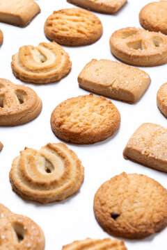 Assorted butter cookies pattern isolated on white background