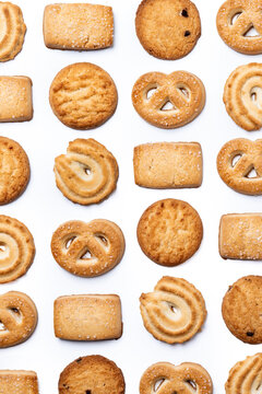 Assorted butter cookies pattern isolated on white background
