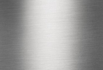 Brushed stainless steel metal texture with fine linear hairline patterns, reflective silver highlights, dark edges, and modern industrial styling for technology backgrounds.