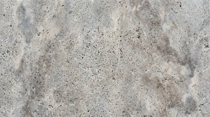 Fototapeta premium Close-up of weathered concrete surface with textured details in natural light