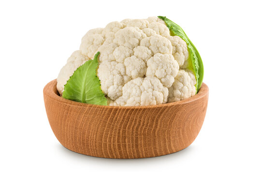 Fresh cauliflower in wooden bowl isolated on white background