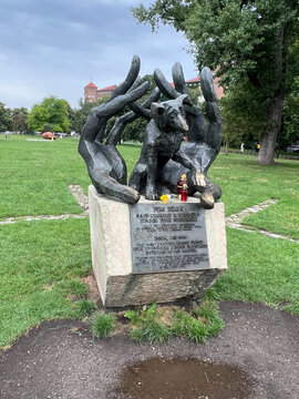 Krakow, Poland, July 26, 2025: Monument to the most faithful of believers, the dog Dzok, on the Vistula River in Krakow, Poland
