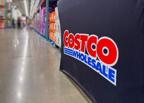 CALGARY, AB, CANADA - SEP 10, 2026: Low-angle close-up of a Costco Wholesale logo on a table cover inside a store aisle in Calgary.