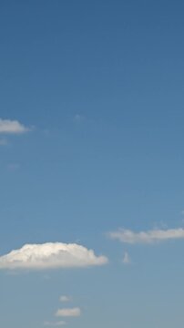 rare white clouds against a blue sky background