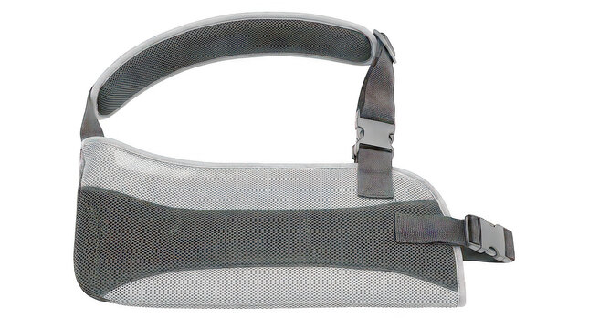 Medical arm sling made of gray and black mesh fabric with adjustable straps and plastic buckles for injury isolated on a transparent background