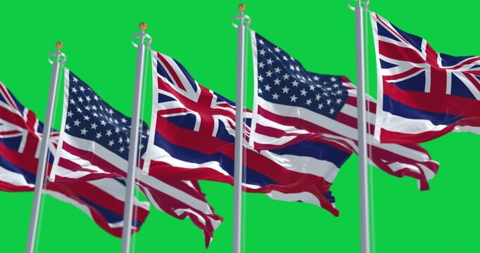 Flags of Hawaii and the US waving in the wind isolated on green background