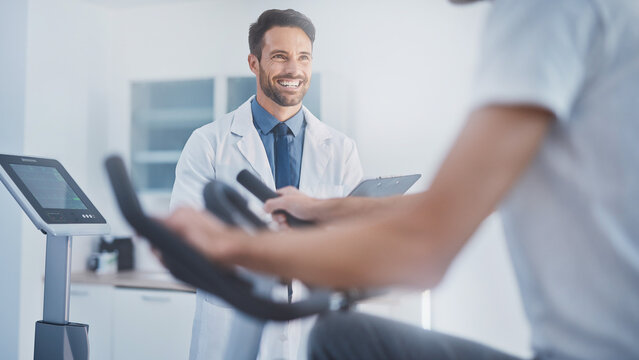 Cardiologist monitoring patient on exercise bike with blurred modern clinic background banner.