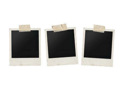 Three aged polaroid pictures secured with masking tape arranged in row on transparent backdrop.