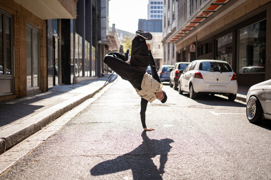breakdancer in the city action shot 