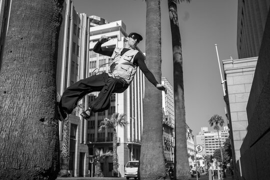 action shot of a parkour athlete in the city