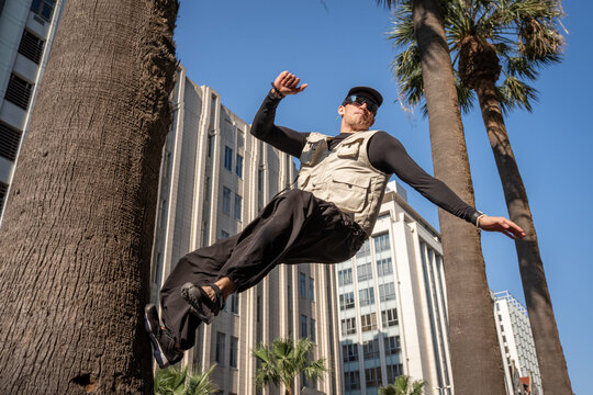 action shot of a parkour athlete in the city