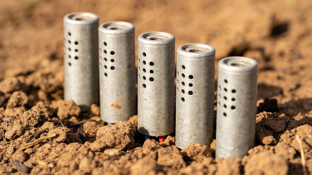 Moisture sensors placed in soil for smart farming and precision agriculture in an agricultural field
