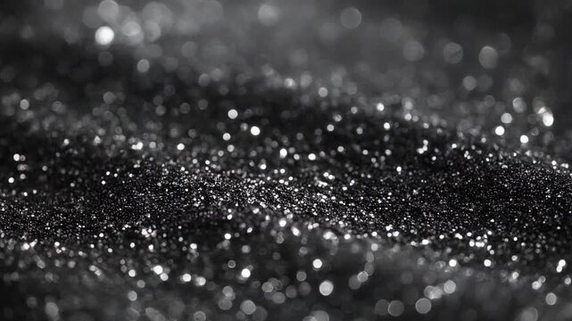 黒い　輝く微細な粒子が広がる抽象的なキラキラ背景テクスチャ