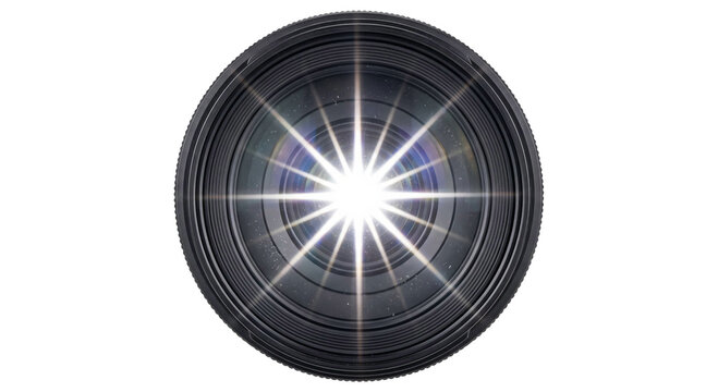 Close-up of a camera lens with a bright starburst flare effect