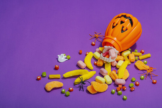 Traditional festive composition for Halloween party. Sweet seasonal food, homemade autumn decor