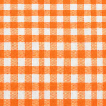 Orange and white checkered gingham pattern background