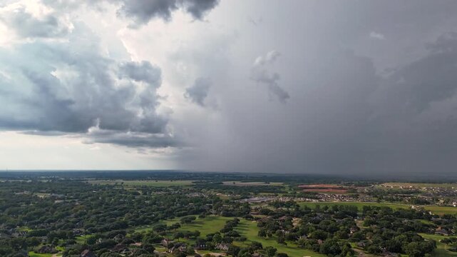 Aerial drone timelapse captures a powerful microburst thunderstorm developing west of Houston, Texas.