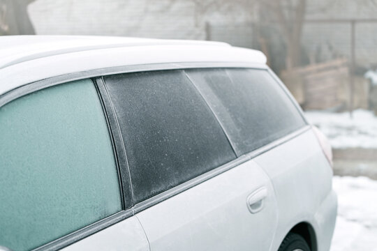 Frozen glass on parked vehicle