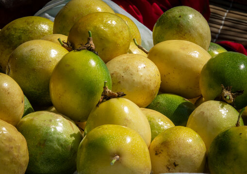 Close-up of a pile of passion fruits displayed for sale at a market, Benguela Province, Benguela, Angola