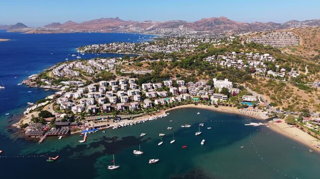 Drone panning around luxury high end holiday villas in Bitez Bodrum along the Turkish South coast