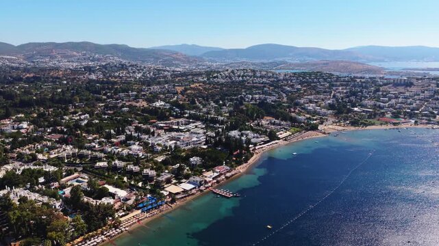Drone cinematically panning around Bitez beach in Bodrum in summer